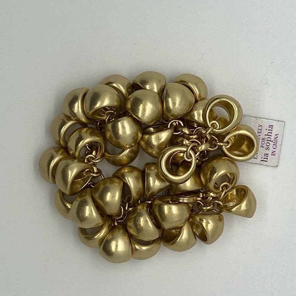 Lia Sophia Gold-tone clasp round dangle bracelet